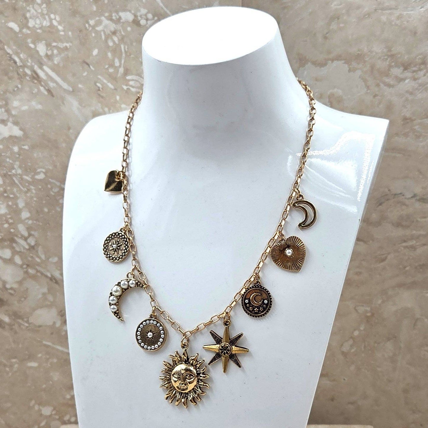 Sun and celestial charm necklace