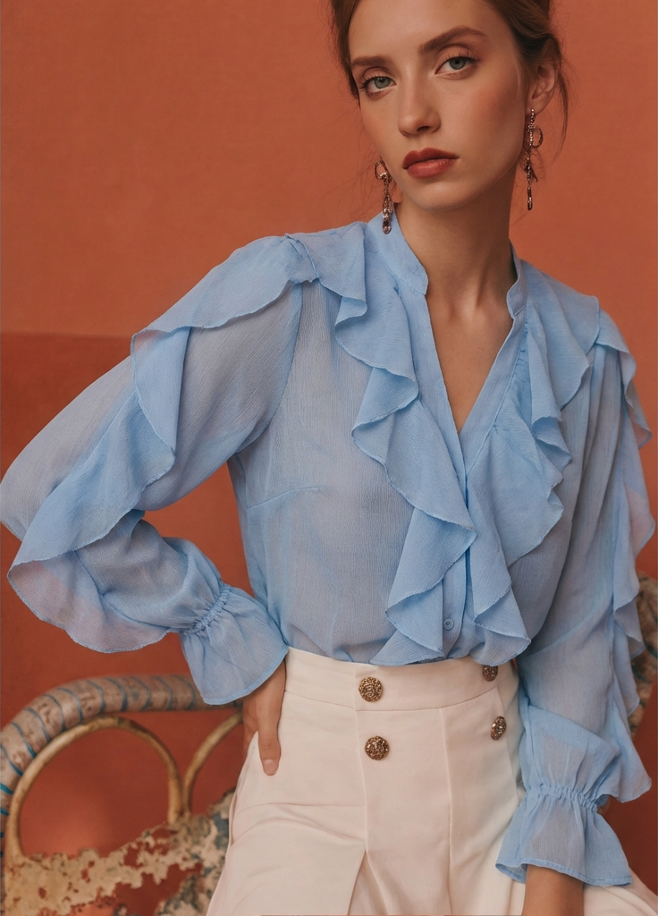 BLUE FRILLY SHIRT