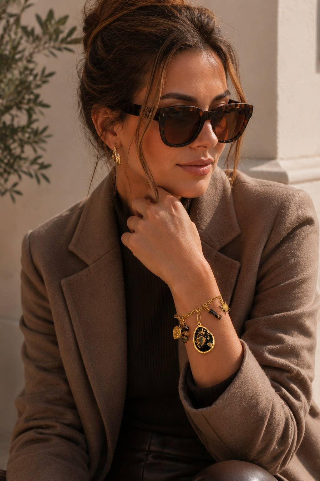 Charm bracelet adorned with stainless steel charms: Golden