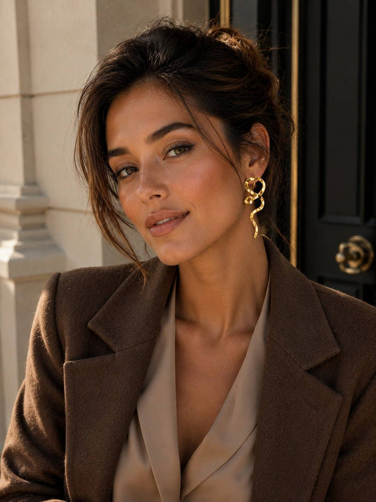 Stainless steel snake dangle earrings: Doré